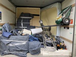 Items to be moved in the back of a moving truck