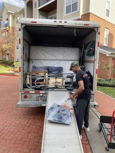 Movers packing a moving truck